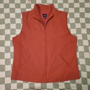 Eileen Fisher orange vest made of Italian fiber